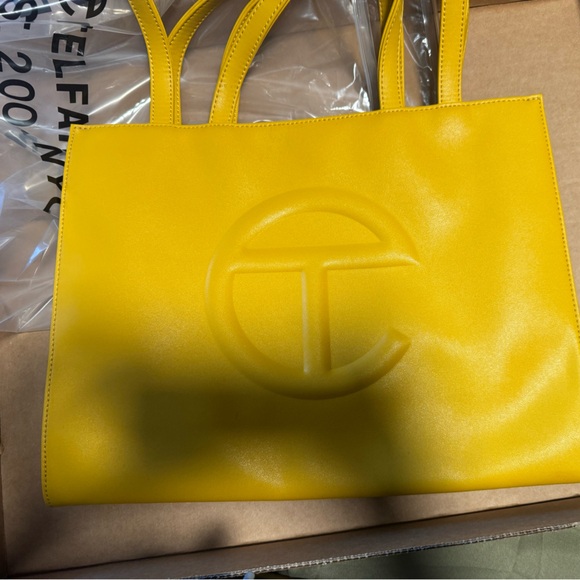 Medium Mustard Telfar shopping bag. Great condition. - Picture 1 of 3